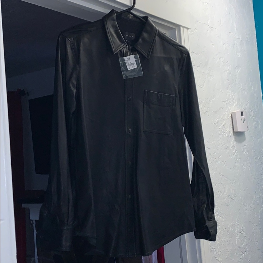 Leather button up.